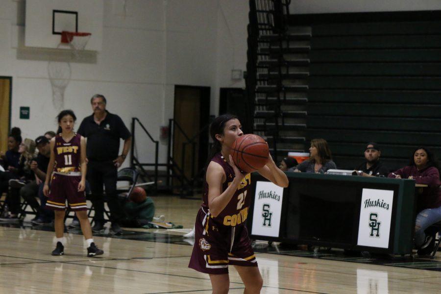 Sophomore Lauren Bustillos shooting free throws at the SHHS game.  
Photo By: Mikel Escobar