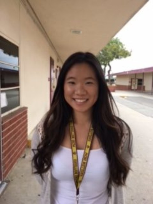 Angel Kuo standing outside of her AP Language and Composition class. Photo by Alysia Velasquez.