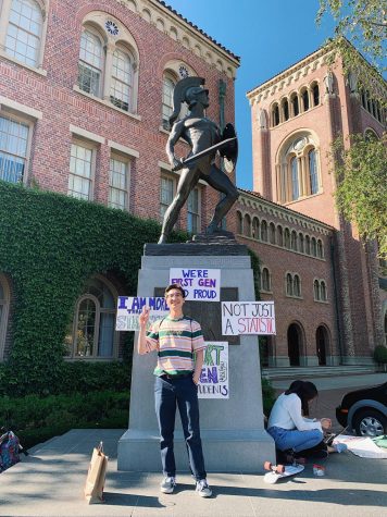 Acosta in front of the bronzed Tommy Trojan statue at USC. Photo credit to Carlos Acosta. 