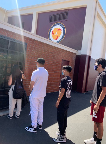 Vending machine line backs up as student tries to get her money back.