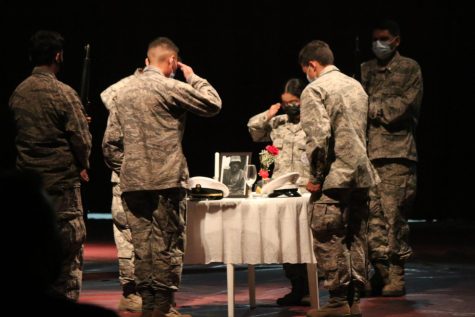 Cadets perform Missing Man Table ceremony, which ends with lighting a candle to represent the fallen who are unable to celebrate this day. Photo by Celeste Perez.