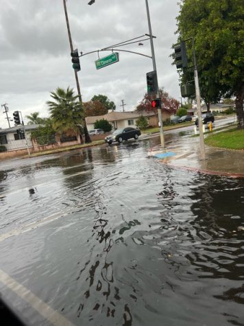 Flooded streets on the Cameron and Glendora Ave. intersection. Photo by Katie Castillo.