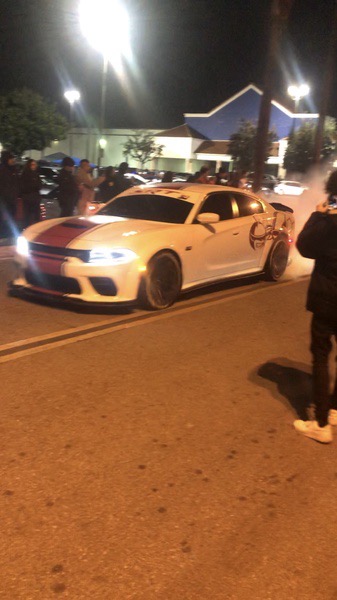 SRT Dodge Charger performing a burnout. 