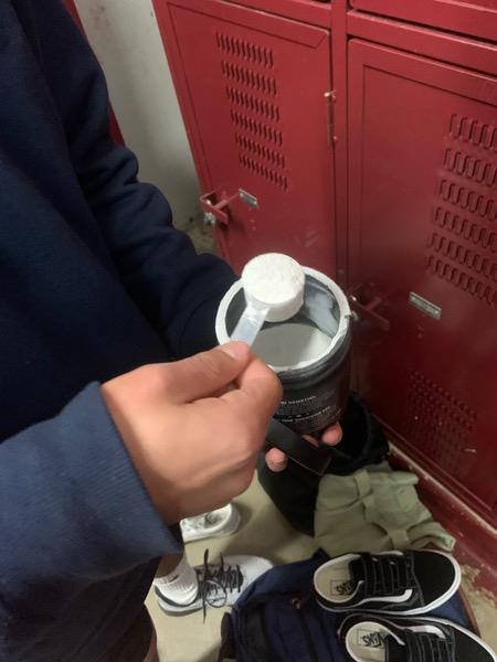 Students scooping pre-workout before going to weightroom
Photo by Gage Ballum