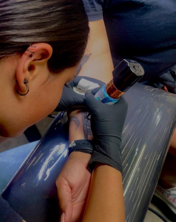 An L.A. Dodgers logo being tattooed on a womans forearm May 13. This was the first tattoo I had done on Friday the 13. The tattoo was one she had been waiting for me to do for a while and finally got it done. It was freehanded with no stencil and done in 30 minutes.