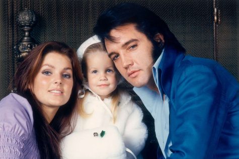 A family portrait (l-r) of Priscilla Presley, Lisa Marie Presley, and Elvis Presley in 1970.