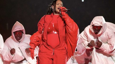 Rihanna performs with background dancers at Arizona’s State Farm Stadium Feb. 12.