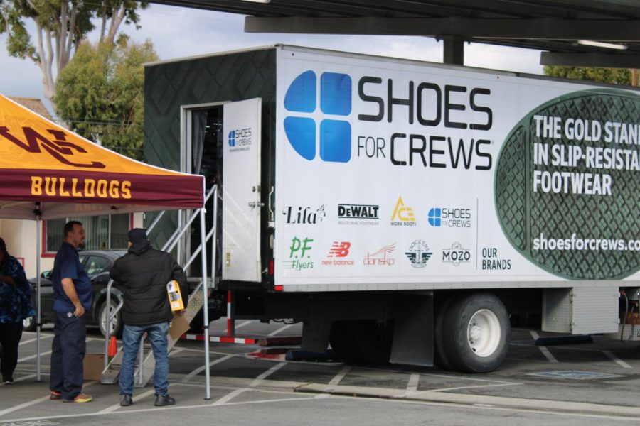 West Covina High School staff wait in line to select their free pair of no-slip shoes from the Shoes For Crews truck. Photo by Sophia Gonzalez. 
