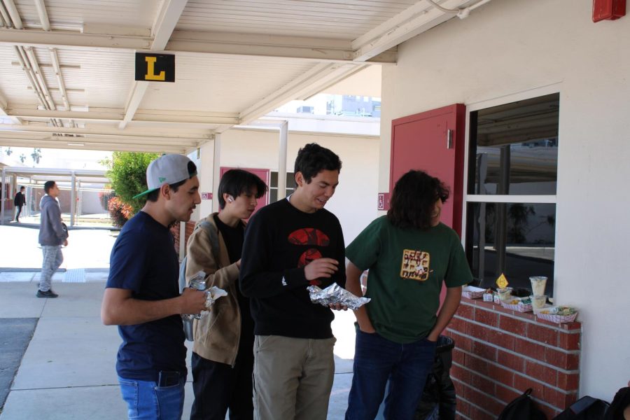 From left to right Cesar Recinos, Erick Alvarado, Oswaldo Gonzalez, and Jesus Rivera hanging out by the L building at lunch on April 5.