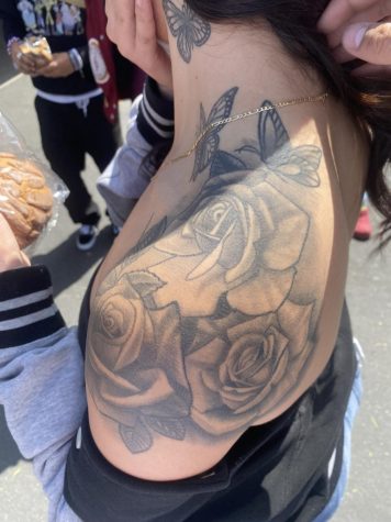 Butterflies and roses tattooed on left shoulder of senior Michelle Polanco