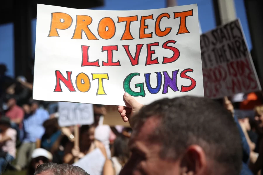 A sign made for a protest walk against gun violence. Photo Credit: Time Magazine