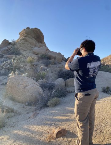 Geo Club Vice President Avery Gomez taking photos of the beautiful sights on Cottonwood Trail.