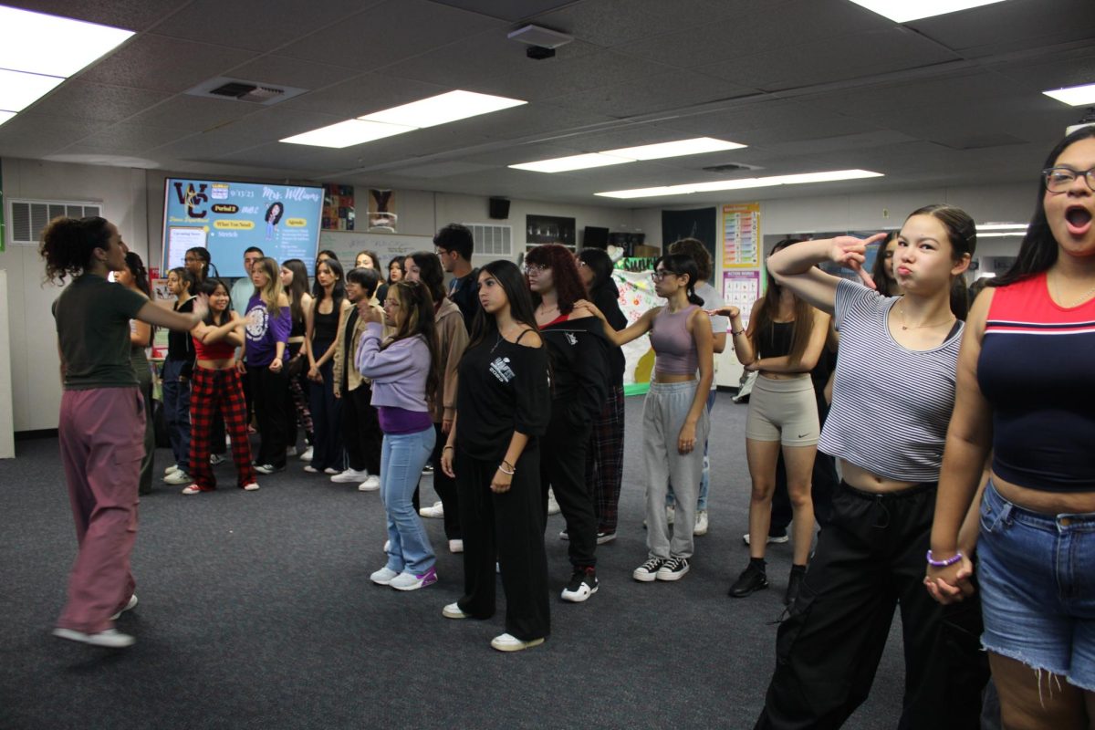Dub. C crowded in the portable while learning a dance.