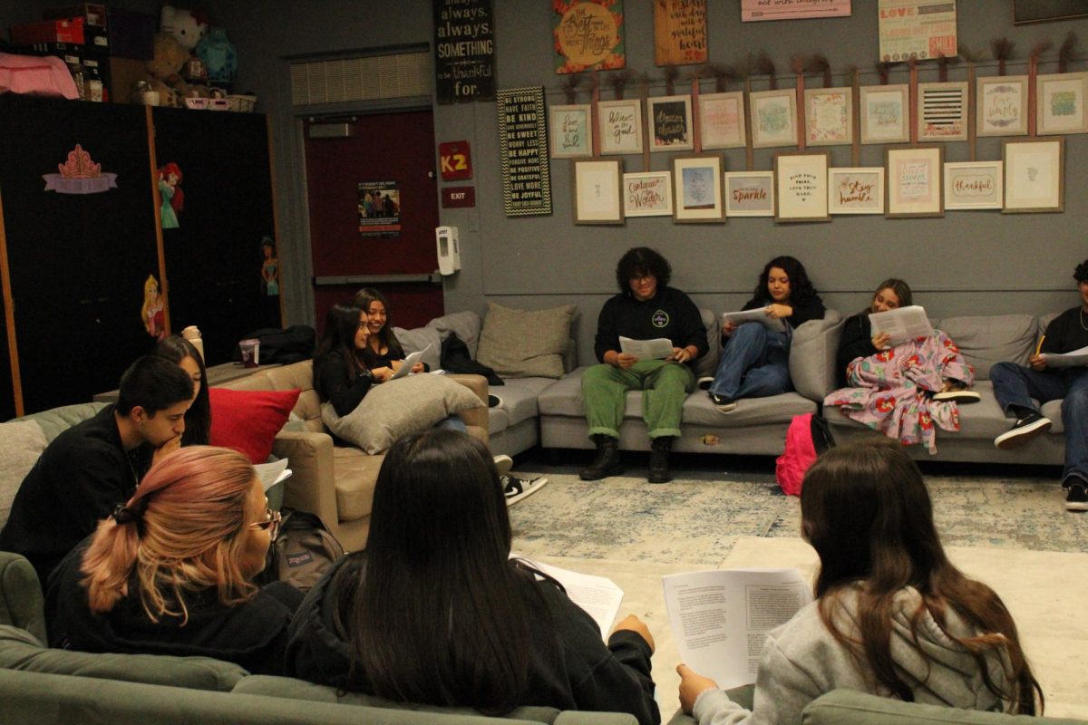 Peer+counseling+class+gathered+together+as+they+discuss+how+to+counsel+others.+