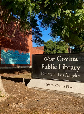 West Covina libraries signs on Pkwy also include a poster on the building stating “West Covina Library is Currently Closed” with servine hours and a recommendation to us in-person service at the Baldwin Park Library.