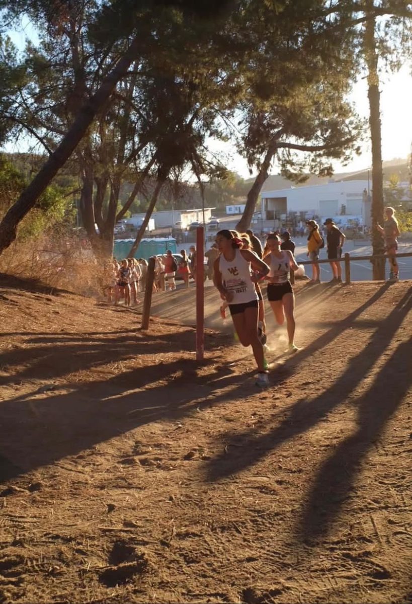 Becky Osorio runs and curves uphill at Mt. Sac invitational on Oct. 20.