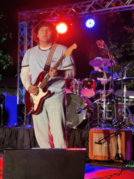Vasquez performs at Renaissance’s West Cochella March 24, 2023 in the T-Plaza. This annual event allows students to express their musical talents and passions. 
