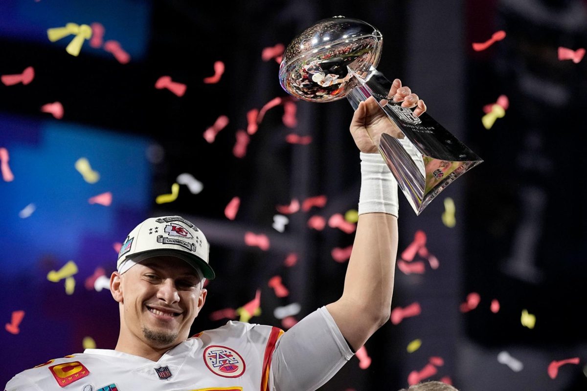 Kansas City Chiefs Quarterback Patrick Mahomes holds the Lombardi Trophy after winning his second Super Bowl Feb. 12, 2023 against the Eagles in Glendale, Ariz. Photo from CNN.
