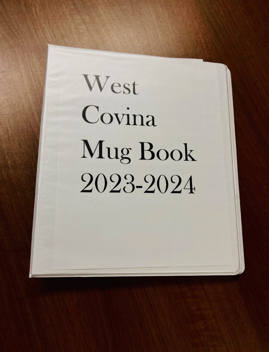 Park utilizes his West Covina Mug Book, a book that contains photos of every student, to memorize students’ names to help him engage with them.
