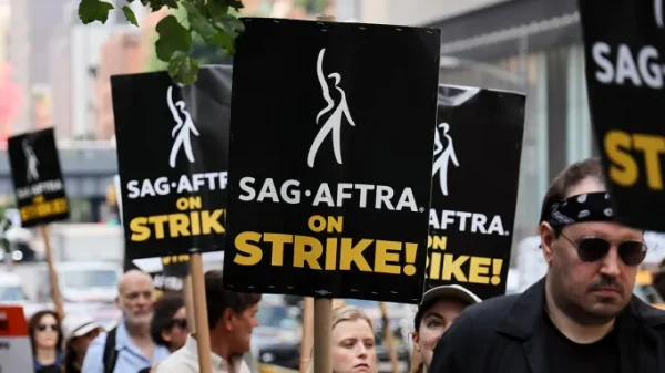 SAG-AFTRA members and supporters protesting on July 18, 2023 in New York City. The labor controversy involved both writers and actors protesting againsts studios for better pay and working conditions. Spider-Man: Beyond the Spider-Verse was the biggest project affected by the strike yet. 