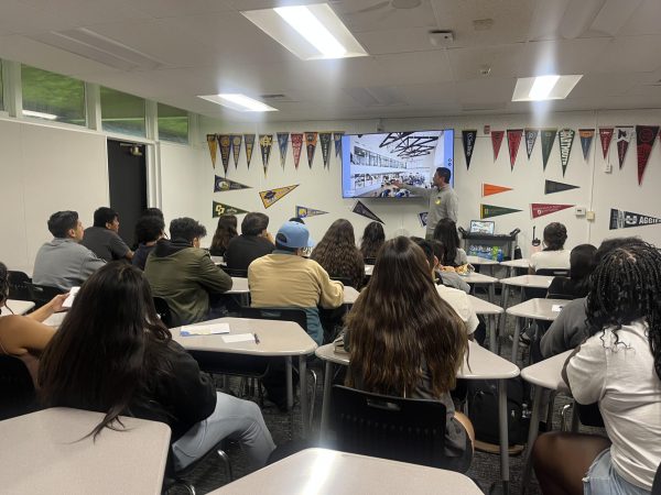 Seniors and an AVID class listen to a representative from VanGuard University providing information about their college and what they have to offer to students. Location-wise some of these schools are very far away… It's just for convenience…You're learning about a school that you might not be able to go to,” said Aguilar. 