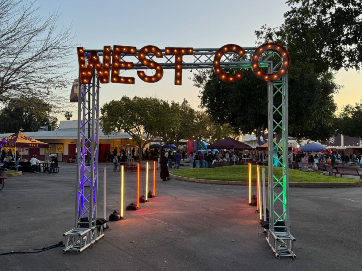 A walkway with glowing lights set up near the Student Services Office. It was directed towards the showcase as people entered the school’s campus and served as a photo opportunity for attendees.