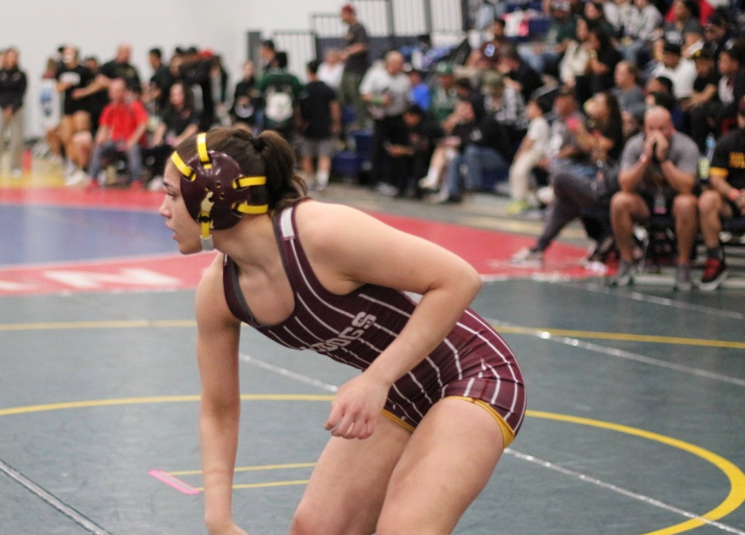 Julie Cimarusti wins at her final match at the California Interscholastic Federation (CIF) Masters. by a pin,when a wrestler holds the opponent’s shoulders to the mat for a set period of time which ultimately ends the match. “I try to just be in my own world when I wrestle. I don’t try to think about who’s expecting what from me,” Cimarusti said. 