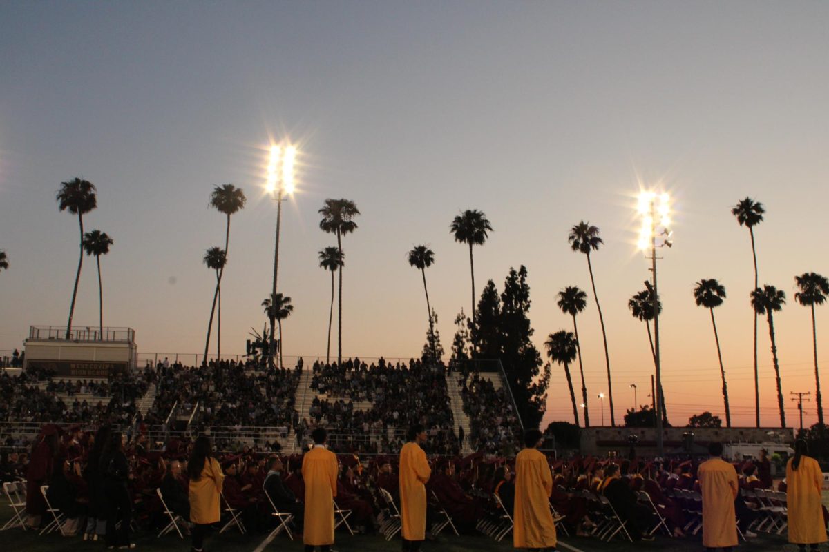 The ceremony begins with graduates seated alongside Top 30 Junior Honor Guard recipients standing by. These juniors are chosen based on having the highest academic achievement status and per tradition, leads the graduates out onto the field.