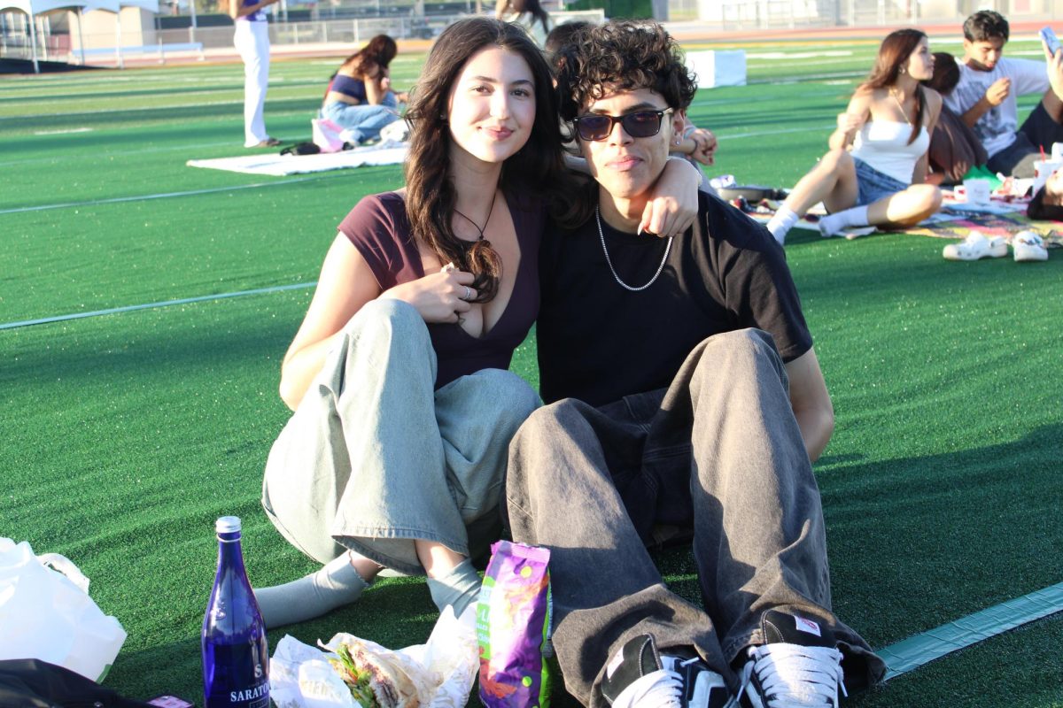 Zoe Brink and boyfriend, Adrian Zamora, enjoy a small picnic with snacks and food from Sprouts Farmers Market. 

“I’m happy, but also scared of what the future will hold for me,” Brink said. 

After graduation, she plans to go to Pasadena Community College then transfer to a 4-year college.
