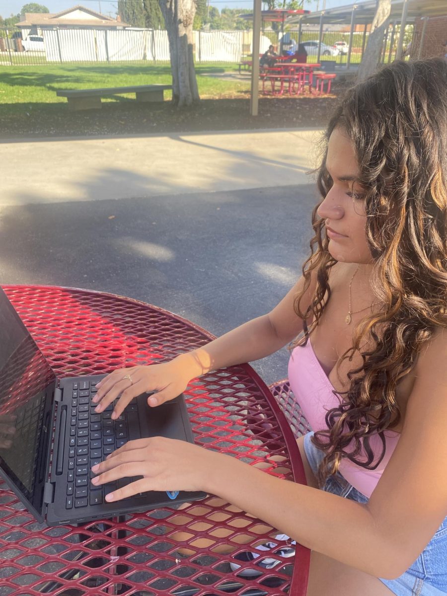 Melanie Valadez, 11, types on a Google Doc Sept. 25 to test when Grammarly will correct her. Valadez uses Grammarly only as revision. "I really don't like it [Grammarly] actually," Valadez said.