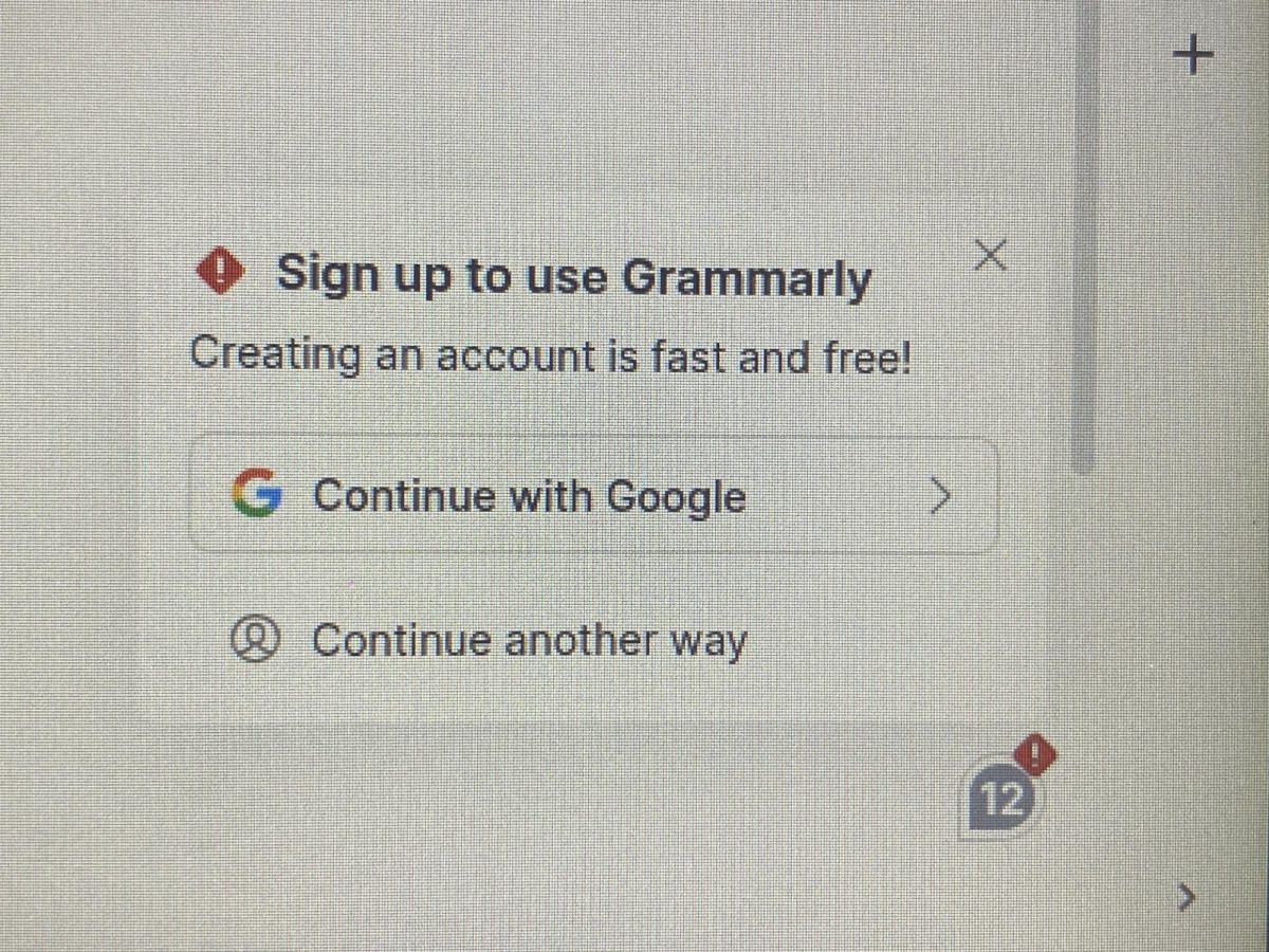 Grammarly ad pops up on Google Doc on Sep. 28 while using a school-provided Chromebook. Grammarly has been turned off multiple times on Google Docs, but continues popping up. "If you click it, it just shows up on your next Google Doc. So it's basically one of the most useless buttons I've ever seen," Olmsted said.