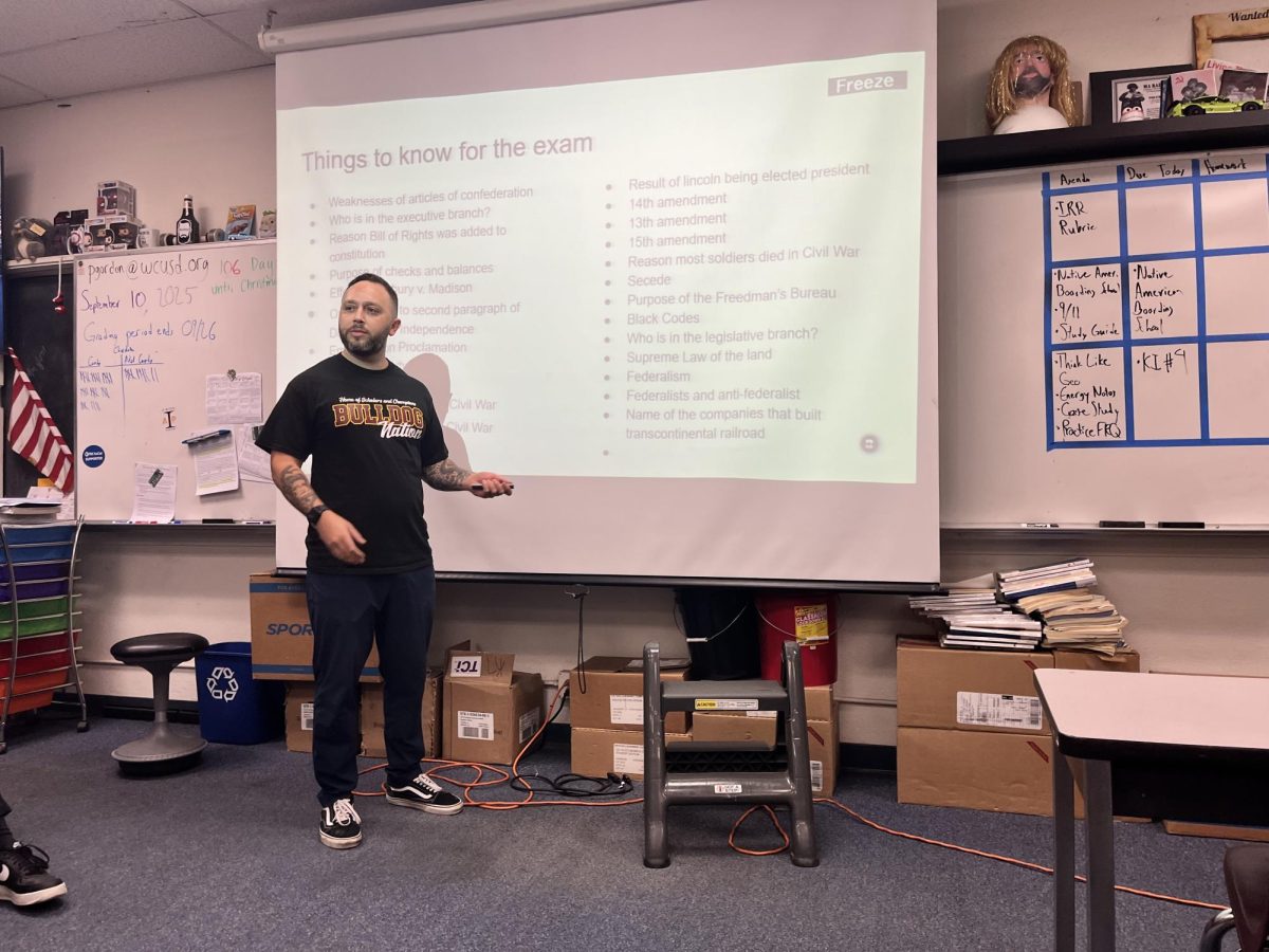 Social science department teacher Paul Gordon teaches his class for an upcoming exam. He has seen an increase in assignments that are being completed on time as well as an increase in student productivity. "I'm getting way more assignments... Kids are completing their work in class on time," Gordon said.