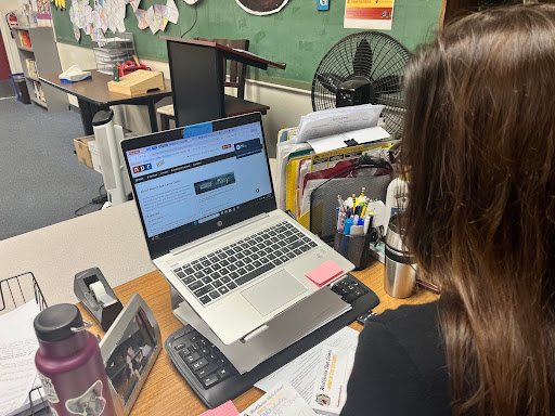 AP English teacher Tonatzin Rodriguez reads a climate change article during lunch. The effect humans have had on the environment is something students need to be aware of. “I think as an individual finding out what is causing these problems and taking tiny steps to help prevent any kind of pollution with our water, it will help, even if it's a little,” Rodriguez said.