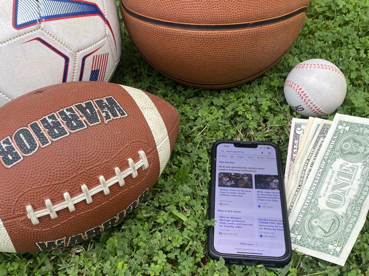  Sports balls, cash and a phone displaying the top stories regarding sports gambling. These trending stories are heard among students, Hurtado shares her thoughts on how athletes could feel about betting. “I feel like it would push them more to try and win, because they have something on the line for their fans and stuff like that," Hurtado said.