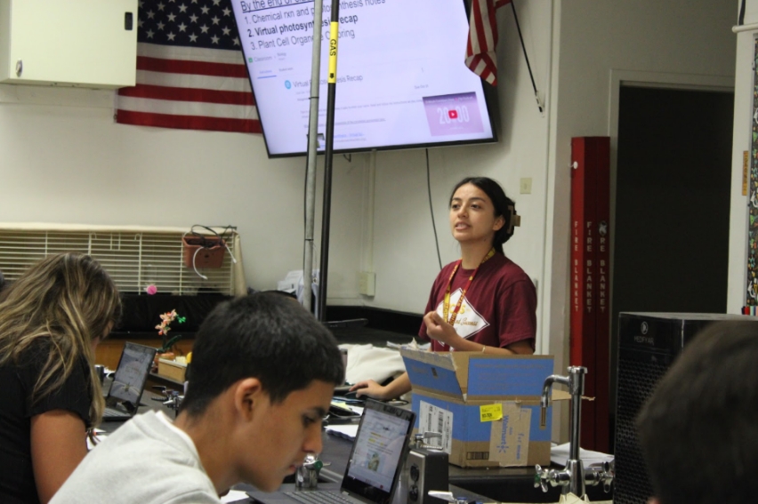 New freshman biology teacher Liza Coe leads her fifth-period class through a lesson on photosynthesis. Coe joined the faculty this year, adding to the school's growing science department. 