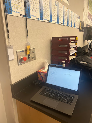 A setup of a Minga pass and lanyards in T-209 to show what the average student has to go through to be allowed to leave their class.  
