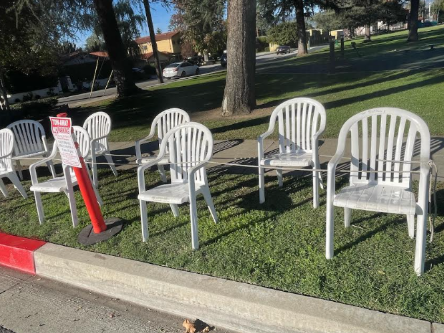 Early setup of chairs lined up in front of Covina Park. People set up for this parade days before it even starts.