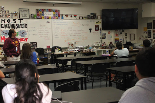 Substitute teacher Cynthia Espinoza-Julio shows English I students the movie Divergent in K-4 to celebrate the class finishing the novel.