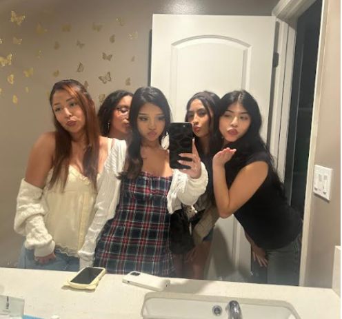 (Left to right), Juniors Niki Flores, Maria Guadalupe, Virginia Hernandez, Marleen Gonzalez and Alyssa Herrera at a Galentine's event Guadalupe hosted. Galentine's is important to a feeling of belonging amongst girls. "We all come together, and we hang out at a friend's house, and we just bring a whole bunch of food and snacks, and it's we just talk and hang out, just spend time together," Herrera said.