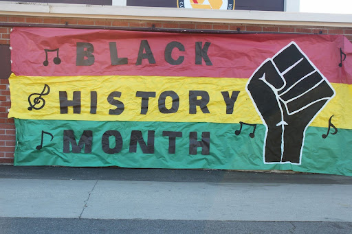 The poster for Black History Month created by ASB that was hung up outside of the Gym. It was designed with the colors of the Pan-African flag which was originated in 1920 by Marcus Garvey’s Universal Negro Improvement Association (UNIA).
