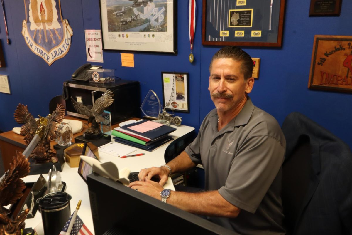 Captain Jesus Acuña-Perez works at his desk yesterday on grading website Aeries. “For West Covina High School at large, I would hope that they continue to support our cadets, their leadership development, and their acceptance as part of the West Covina High School Bulldog fabric, because we are an integral part of this institution, and I would hope that it remains that way,” Acuña-Perez said.