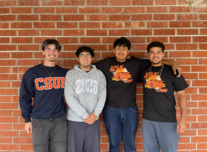 Seniors Christopher Buhac, Issac Ojeda, Christian Rosatty and Dylan Burks on their last day of being in the band classroom before graduation. “It was a really great experience being able to make so many friends, meet so many new people, and make a relationship with those people,” Buhac said.